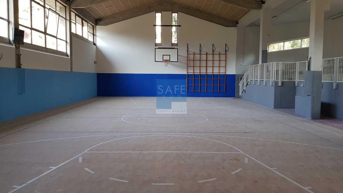 Rivestimento antitrauma Tetris su pareti di palestra a Verona.